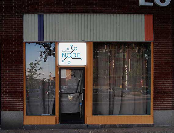 File:FrontWindow SignAboveLighted.jpg